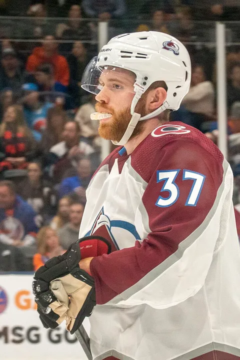 J. T. Compher